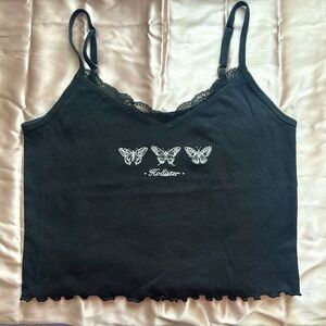 Cropped Graphic Tank Top 
Size: Medium